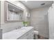 Bathroom featuring decorative tiling, marble vanity top, and recessed lighting at 6006 114Th N Ter, Pinellas Park, FL 33782