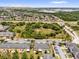 Aerial view showing a community nestled near green spaces and convenient highway access at 6924 Towne Lake Rd, Riverview, FL 33578