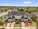 An aerial view highlighting the home's driveway, garage, and well-kept landscaping at 6924 Towne Lake Rd, Riverview, FL 33578