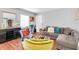Cozy living room featuring stylish furnishings, hardwood floors, and plenty of natural light at 6960 Sunset S Dr # 2B, South Pasadena, FL 33707