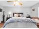 Serene main bedroom featuring a comfortable bed, soft lighting, and relaxing decor at 6960 Sunset S Dr # 2B, South Pasadena, FL 33707