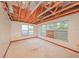 Bedroom featuring exposed ceiling, open ceiling and three windows at 7033 Wentworth Way, New Port Richey, FL 34655