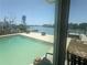 Backyard pool view of the canal and neighborhood from the sunroom window at 7832 3Rd S Ave, St Petersburg, FL 33707