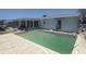Backyard pool with patio and a partial view of the home's exterior at 7832 3Rd S Ave, St Petersburg, FL 33707