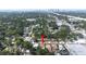 Scenic aerial view highlighting the home's location within a lush, green neighborhood at 910 E Chelsea St, Tampa, FL 33603