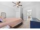 Inviting bedroom with doorway, closet and carpet at 910 E Chelsea St, Tampa, FL 33603