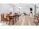 Bright living room features light hardwood floors, a large couch, and a modern design at 910 E Chelsea St, Tampa, FL 33603