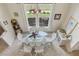 Aerial view of a dining area that features modern decor and plenty of natural light at 9322 Via Segovia, New Port Richey, FL 34655