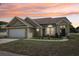 Charming single-story home with manicured lawn and attached two-car garage, beautifully designed with modern fixtures at 9322 Via Segovia, New Port Richey, FL 34655