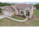 Beautiful single Gathering home with manicured lawn, two car garage, and a lovely entryway at 9322 Via Segovia, New Port Richey, FL 34655
