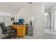 Bright office with a desk and chair perfect for remote work at 9322 Via Segovia, New Port Richey, FL 34655
