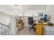 Upstairs office nook features built-in shelving, desk, and neutral walls at 9322 Via Segovia, New Port Richey, FL 34655