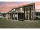 A covered, screened porch offers relaxation and protection from the elements in this lovely home at 9322 Via Segovia, New Port Richey, FL 34655