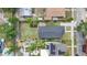 Aerial view showcases the property's layout, back yard, and neighborhood at 1006 E 23Rd Ave, Tampa, FL 33605