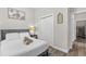 Comfortable bedroom features queen bed, modern decor, and closet at 1006 E 23Rd Ave, Tampa, FL 33605