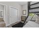 Bright bedroom featuring a bunk bed, closet, and modern decor at 1006 E 23Rd Ave, Tampa, FL 33605