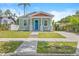 Charming single-story home with manicured lawn and tidy landscaping, with street view at 1006 E 23Rd Ave, Tampa, FL 33605