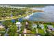Aerial view of home, lake, and neighborhood, marked with a house icon at 1045 28Th S Ave, St Petersburg, FL 33705
