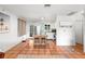 Bright and airy living space featuring an open layout with direct access to a modern kitchen and stylish decor at 1045 28Th S Ave, St Petersburg, FL 33705