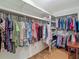 Walk-in closet with multiple clothing racks and shelves at 10930 Marjory Ave, Tampa, FL 33612