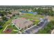 Aerial of the community center, showcasing recreational facilities and parking at 11363 Cocoa Beach Dr, Riverview, FL 33569
