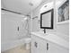 Refreshed bathroom featuring a sleek vanity, framed mirror, and glass-enclosed shower at 11363 Cocoa Beach Dr, Riverview, FL 33569