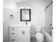Bright bathroom featuring a modern vanity, framed mirror, and glass-enclosed shower at 11363 Cocoa Beach Dr, Riverview, FL 33569