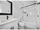 Stylish bathroom showcasing a sleek vanity, modern fixtures, and glass shower doors at 11363 Cocoa Beach Dr, Riverview, FL 33569