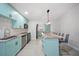 Stylish kitchen boasts sleek appliances, countertops, a kitchen island, and ample storage at 11363 Cocoa Beach Dr, Riverview, FL 33569