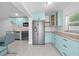 Kitchen with modern appliances, generous countertop space, and an inviting breakfast bar at 11363 Cocoa Beach Dr, Riverview, FL 33569