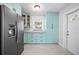 Modern kitchen with stainless steel appliances, and ample cabinet space at 11363 Cocoa Beach Dr, Riverview, FL 33569