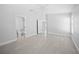 Spacious main bedroom featuring neutral tones, ample natural light, and an en-suite bathroom at 11363 Cocoa Beach Dr, Riverview, FL 33569