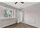 Cozy bedroom featuring a window and open doorway at 11615 Mango Ridge Blvd # 39, Seffner, FL 33584