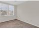 Bright bedroom features a large window, offering plenty of natural light and a serene view at 11615 Mango Ridge Blvd # 39, Seffner, FL 33584