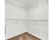 Walk-in closet with built-in shelving for optimal storage and organization at 11615 Mango Ridge Blvd # 39, Seffner, FL 33584
