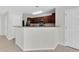 Modern kitchen with stainless steel appliances, breakfast bar, and tile flooring at 11615 Mango Ridge Blvd # 39, Seffner, FL 33584