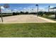 A community basketball court is shown at 12032 Grand Kempston Dr, Gibsonton, FL 33534