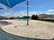 A community pool features lounge chairs and clear blue skies at 12032 Grand Kempston Dr, Gibsonton, FL 33534