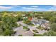 Charming residential street with well-maintained homes, mature trees, and colorful landscaping creates a welcoming neighborhood atmosphere at 12401 Yorktown Ln, Bayonet Point, FL 34667