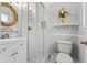Bathroom with white subway tiles in the shower and black and white tile flooring at 1302 E Flora St, Tampa, FL 33604