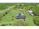Expansive property with a pool, outbuildings, and a well-maintained lawn at 13341 Hexam Rd, Weeki Wachee, FL 34613