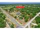 Aerial view of a property in a secluded, wooded area, bordered with a red boundary line, marking the land for sale at 13341 Hexam Rd, Weeki Wachee, FL 34613