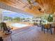 Enjoy the beautiful screened-in pool, outdoor ceiling fans, and plenty of room for entertaining friends and Gathering at 13341 Hexam Rd, Weeki Wachee, FL 34613