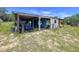 Open shed offers storage and workspace for projects or equipment at 13341 Hexam Rd, Weeki Wachee, FL 34613