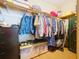 Walk-in closet featuring built-in shelving and storage, ideal for organization at 13341 Hexam Rd, Weeki Wachee, FL 34613
