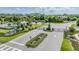 Aerial view of Willow Square entrance with gated entry and manicured landscaping at 1396 White Fox Run, Lutz, FL 33549