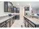 Modern kitchen featuring granite countertops and stainless steel appliances at 1396 White Fox Run, Lutz, FL 33549