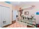 Bright bedroom featuring a surfboard wall decoration and colorful cubbies at 14612 Corkwood Dr, Tampa, FL 33626