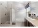 Bright main bathroom featuring a shower, garden tub, and vanity with sink at 14612 Corkwood Dr, Tampa, FL 33626