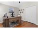 Office featuring wood floors, dual monitors, and closet at 14612 Corkwood Dr, Tampa, FL 33626